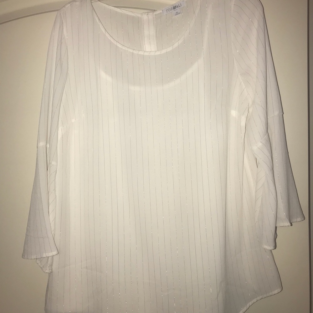 White blouse with gold stripes